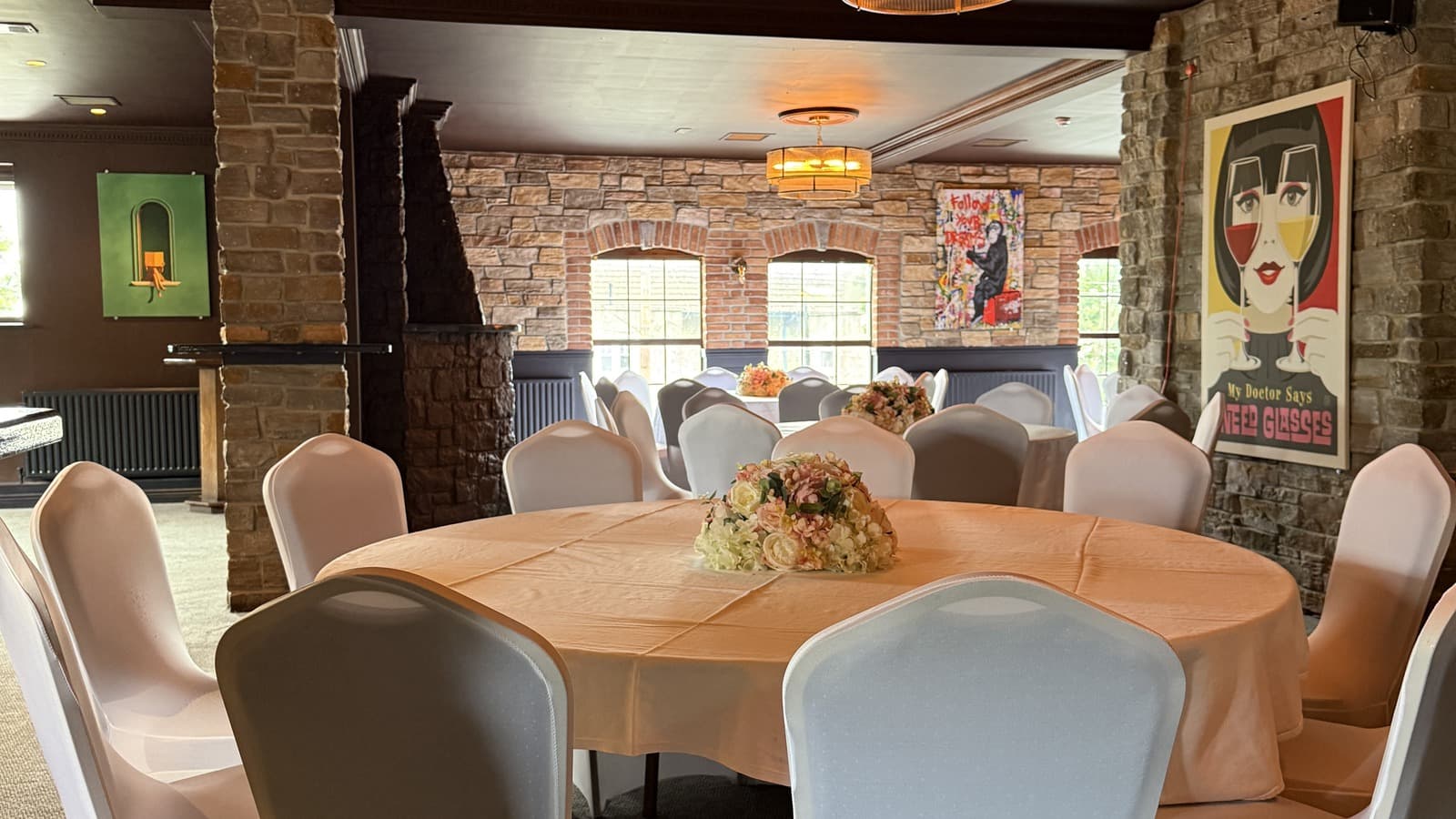 Another view of the Function Room's dining layout, with tables set for guests