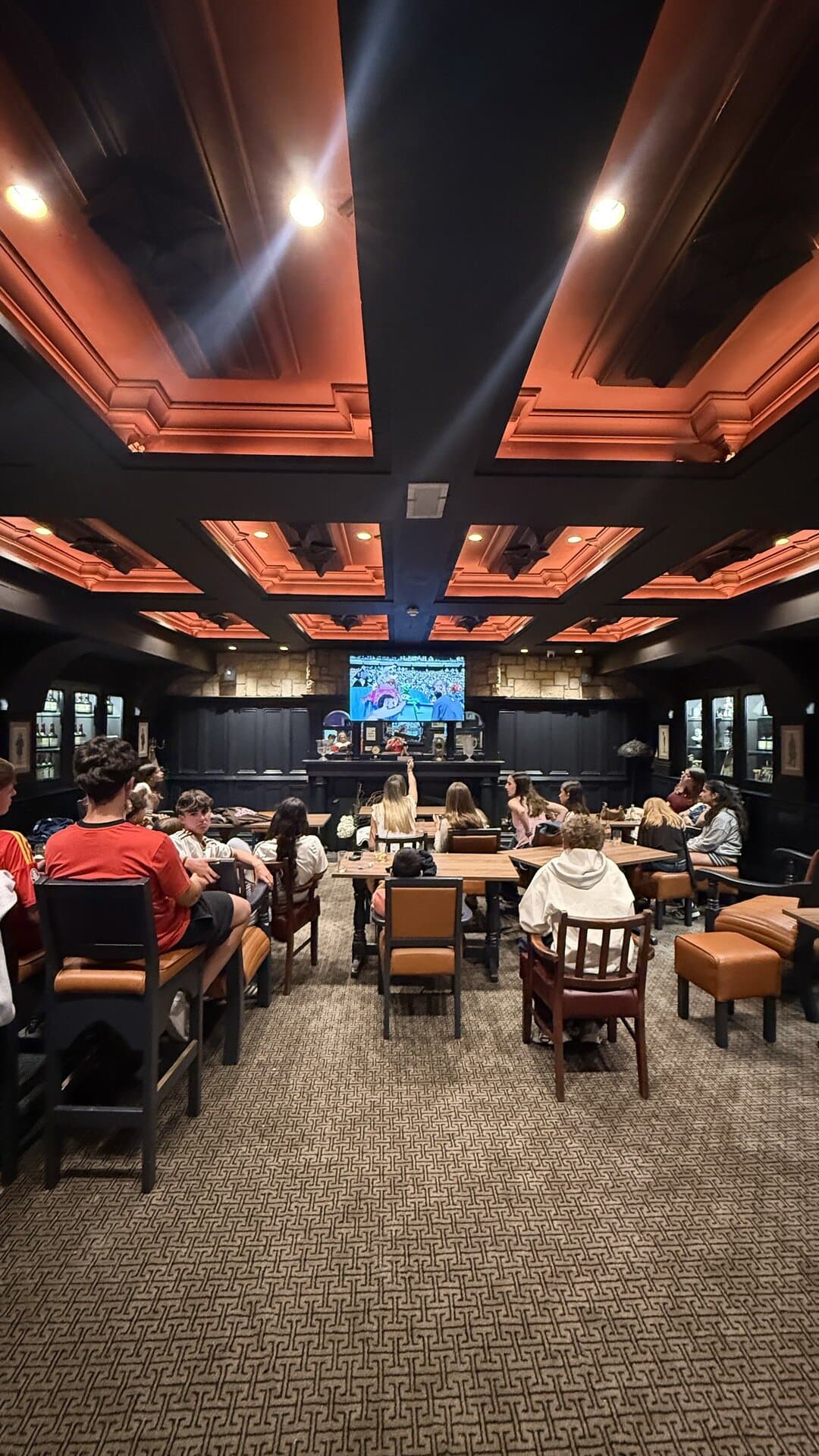 The Library in use during a gathering, with the tables dressed
